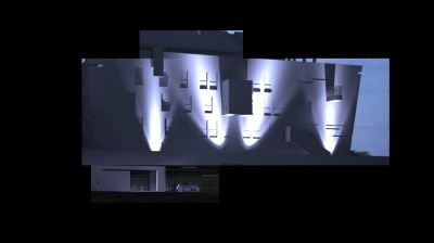 Widok sugestywnie podświetlonego budynku / A view of the lightining of the  building.